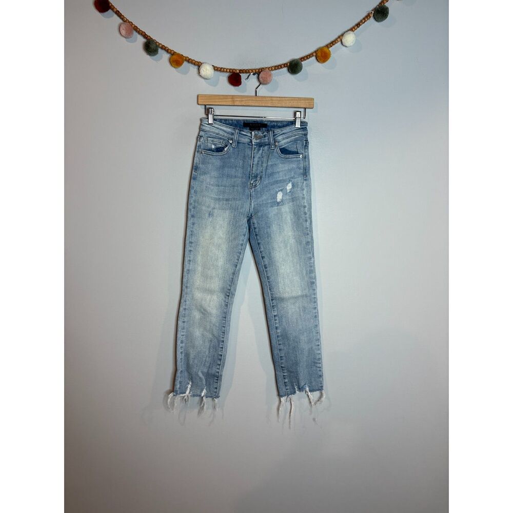 Risen light wash raw hem jeans